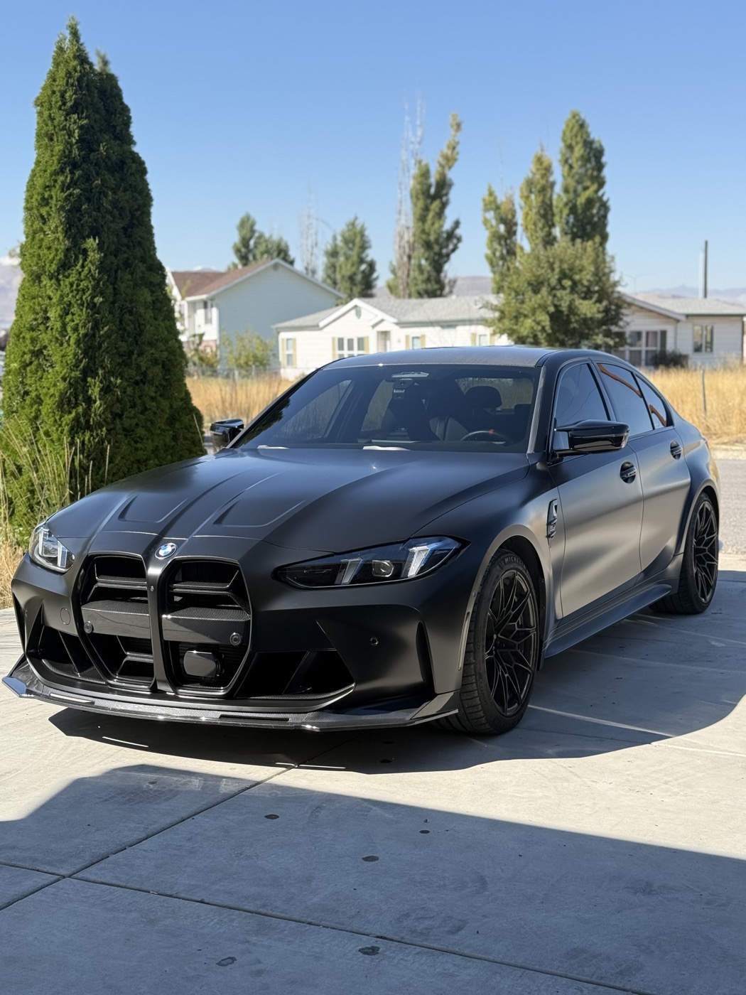 Matte black BMW widebody color change wrap — Summit Wraps Utah
