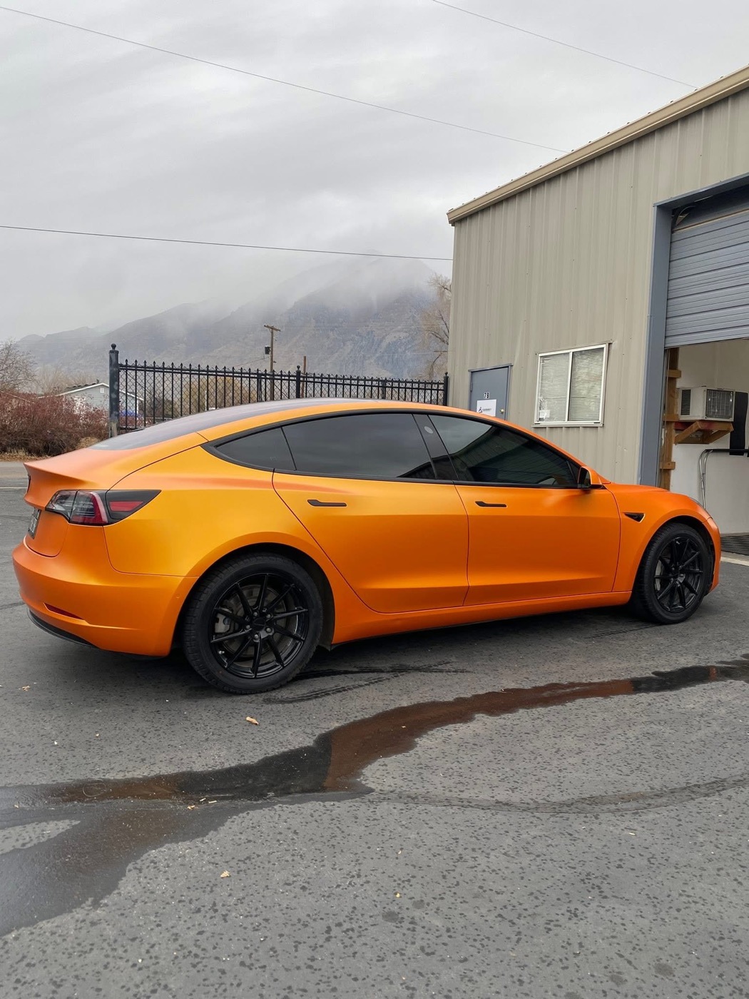 Satin orange Tesla Model 3 color change wrap — Summit Wraps Utah