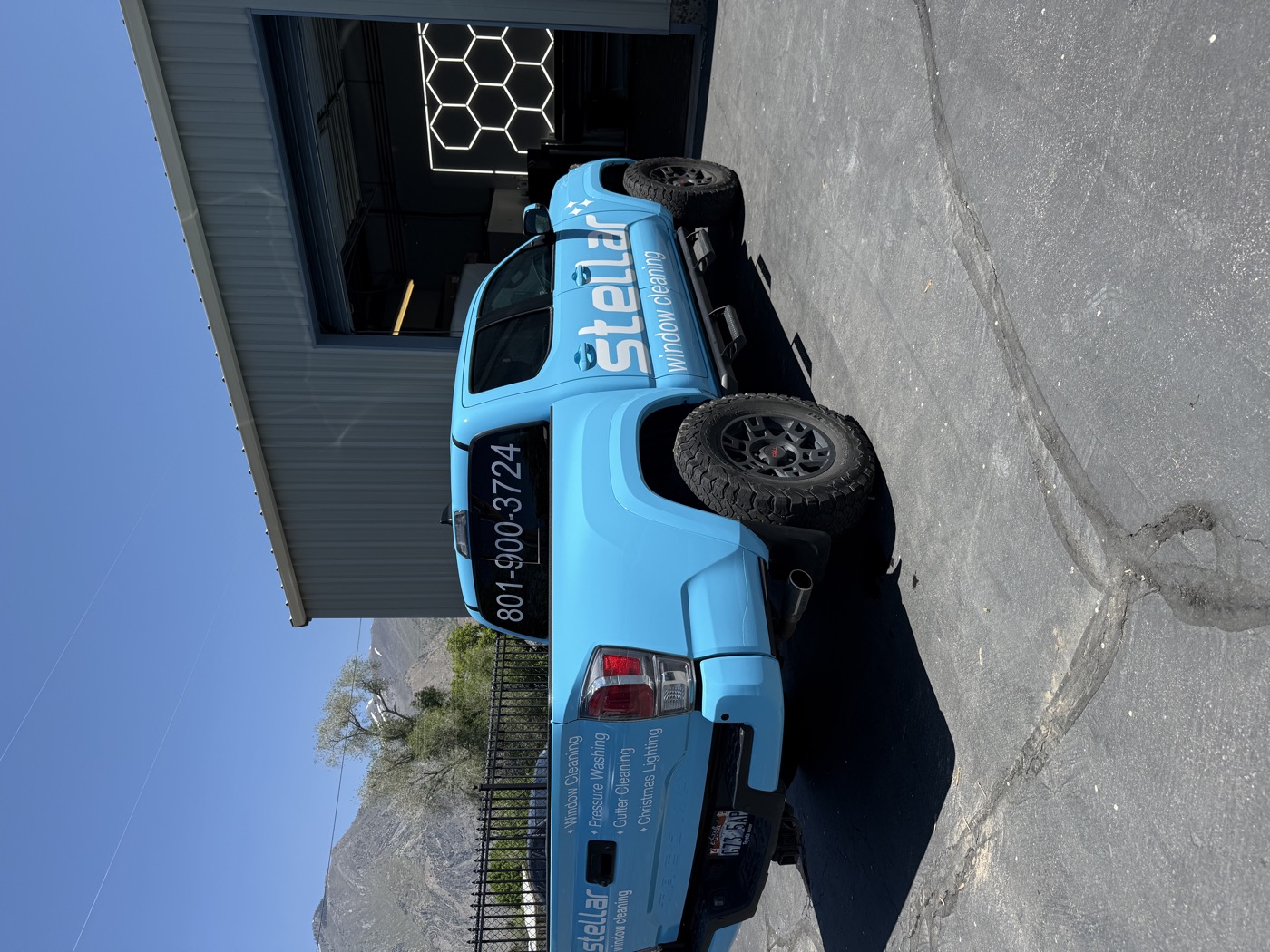 Stellar Window Cleaning truck wrap — bright blue commercial wrap Utah