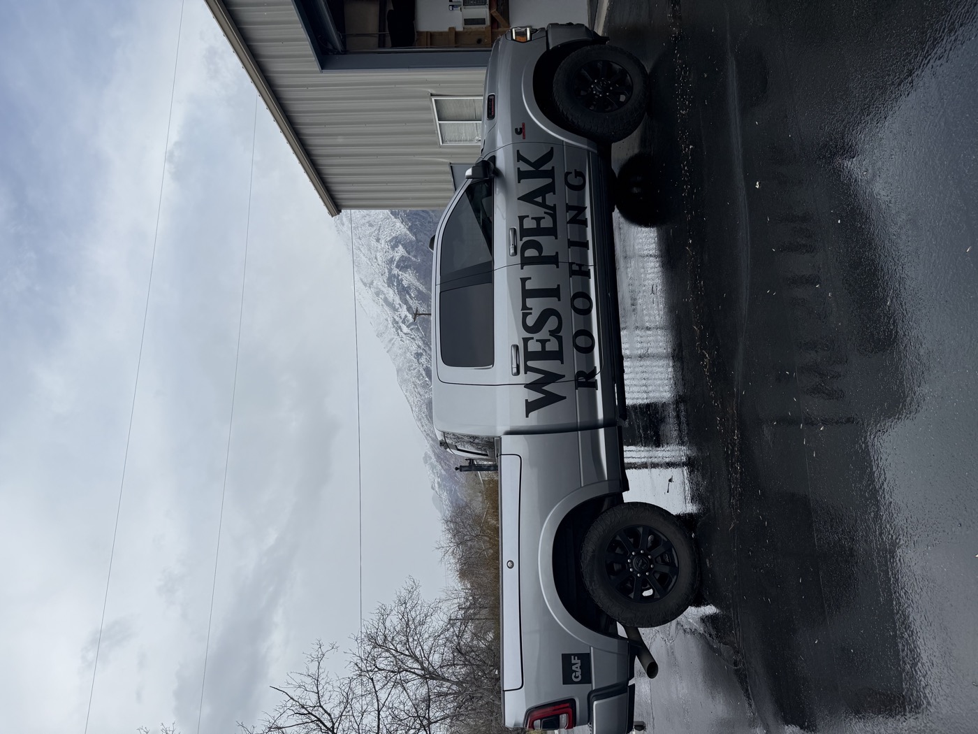 West Peak Roofing Ram truck partial wrap — Summit Wraps Utah